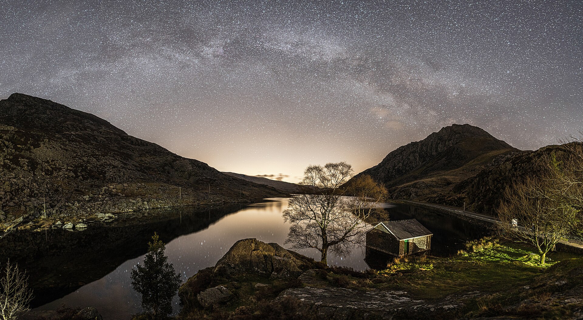 The Milky Way over Llyn Ogwen in Eryri, whose International Dark Sky Reserve borders the Llŷn Peninsula